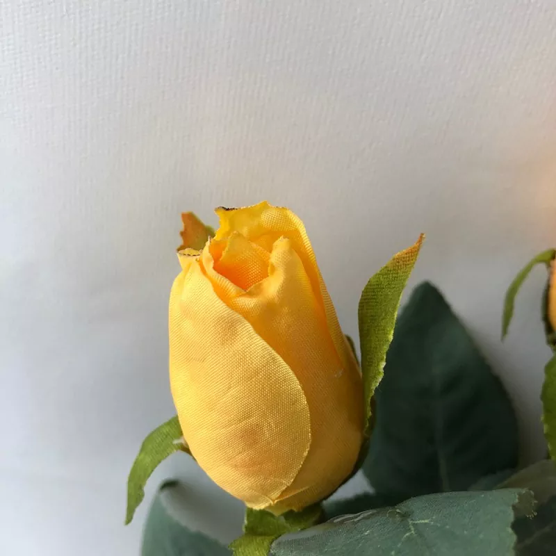 white silk rose bouquet with greenery